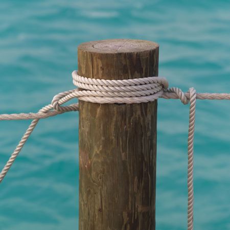 Parrot Cay,Wooden Post on Dockの写真素材