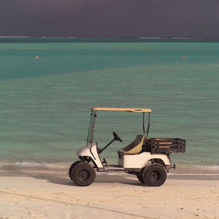 Parrot Cay,Golf cart on Parrot Cay beach