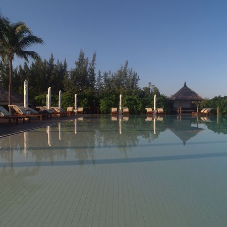Parrot Cay,Lounge chairs at poolsideの写真素材