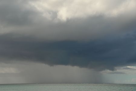 Parrot Cay,Clouds over Parrot Cay beachの写真素材