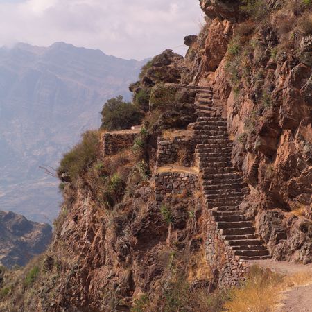 Ruins of Pisaq - Temple of the Sun in Peru, Stairs along Mountainsideの写真素材