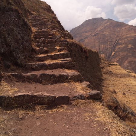 Ruins of Pisaq - Temple of the Sun in Peru, Stairs along mountainsideの写真素材
