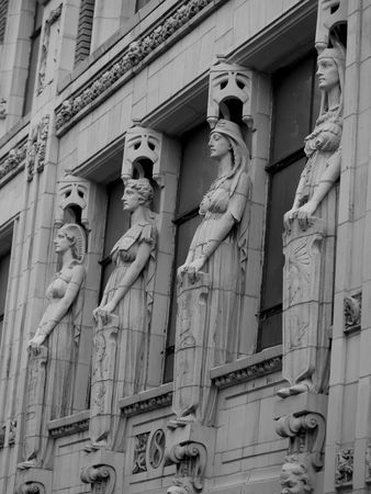 Carved Statues on Façade of Building in Montrealの写真素材
