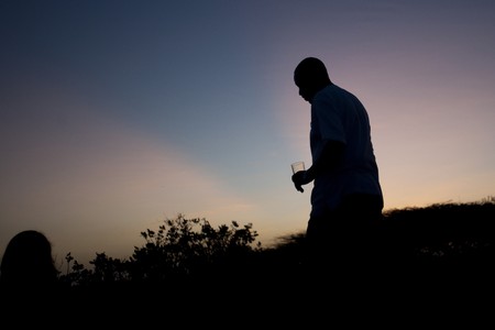 Silhouette of man against Kenya sky at sunsetの写真素材