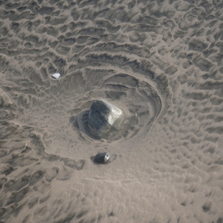 Stones and sea shells along the beach in Costa Rica