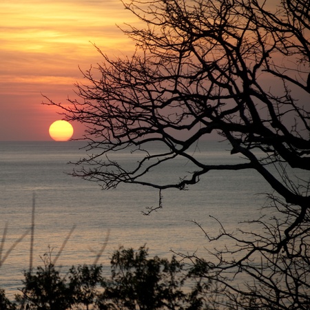 Sunset over Costa Rica coastal watersの写真素材