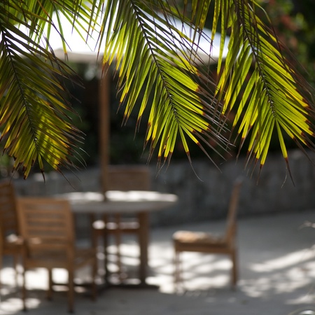 Poolside table and chairs in Costa Ricaの写真素材