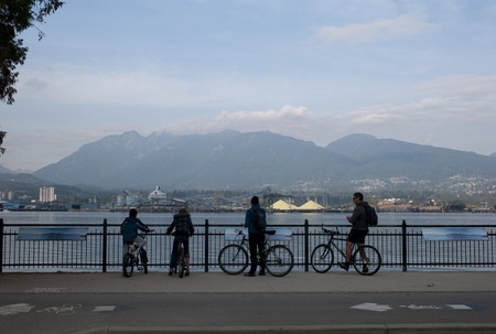 Tourists at a lookout point in Stanley Park in Vancouver, British Columbia, Canadaの写真素材