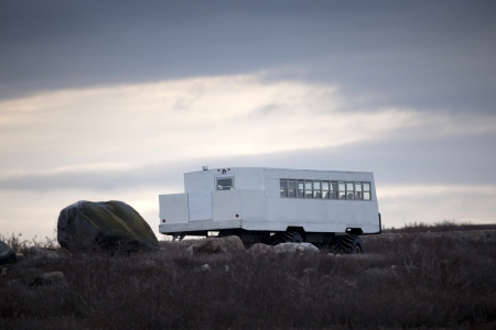 Tundra buggy on dirt road, Churchill, Manitoba, Canadaの写真素材