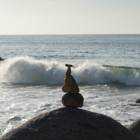 Stack of stones at coast, Sayulita, Nayarit, Mexicoの写真素材