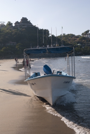Fishing boat on the beach, Sayulita, Nayarit, Mexicoのeditorial素材