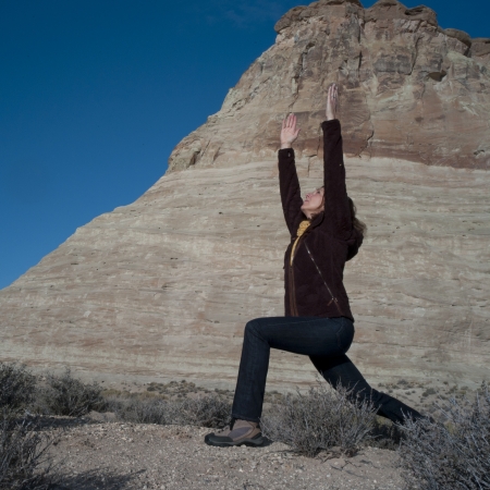Woman practicing yoga on a rock, Utah, USAの写真素材