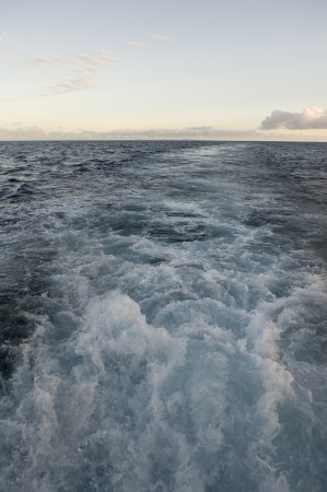 Wake formed by the moving ship in the ocean, Galapagos Islands, Ecuadorの写真素材