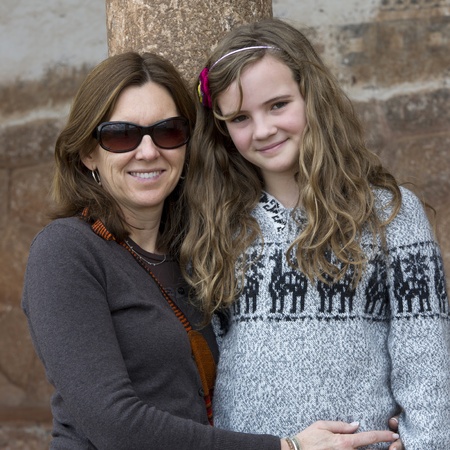 Woman hugging her daughter and smiling, Chinchero, Sacred Valley, Cusco Region, Peruのeditorial素材
