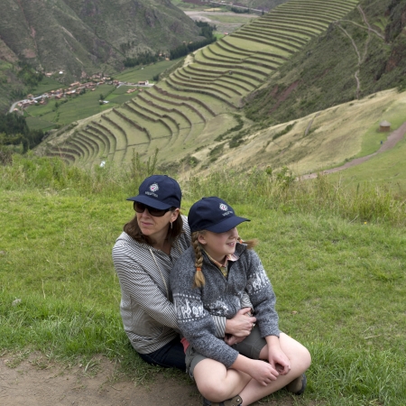 Woman relaxing with her daughter at Archaeological Park of Pisac, Pisac, Sacred Valley, Cusco Region, Peruのeditorial素材