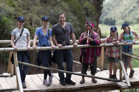 Man with his family on a footbridge at Archaeological Park of Pisac, Pisac, Sacred Valley, Cusco Region, Peruのeditorial素材