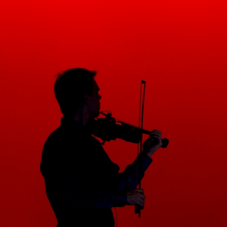 Violinist performing at Hughes American Family Theater, Branson, Taney County, Missouri, USAの写真素材