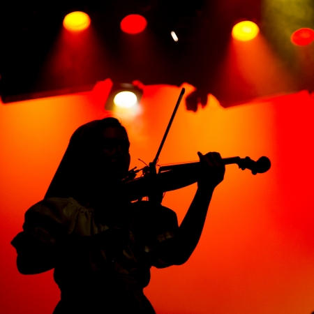 Violinist performing at Hughes American Family Theater, Branson, Taney County, Missouri, USAの写真素材