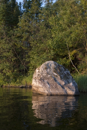 Boulder on the shoreline, Lake of The Woods, Keewatin, Ontario, Canadaの写真素材