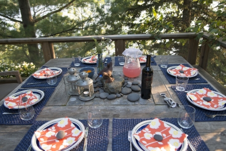 Dining table on a deck at Lake of The Woods, Keewatin, Ontario, Canadaのeditorial素材