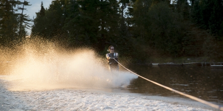 Man waterskiing in a lake, Lake of The Woods, Keewatin, Ontario, Canadaのeditorial素材