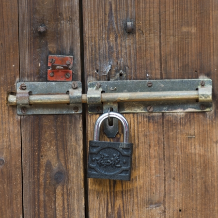 Close-up of a door locked with a padlock, Xingping, Yangshuo, Guilin, Guangxi Province, Chinaのeditorial素材