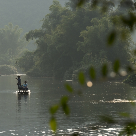 Tourists on a bamboo raft in Yulong River, Yangshuo, Guilin, Guangxi Province, Chinaのeditorial素材
