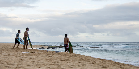 Surfers on the beach, Sandy Beach, Hawaii Kai, Honolulu, Oahu, Hawaii, USAのeditorial素材