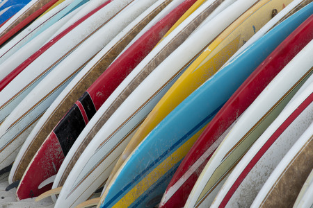 Surfboards in a row on the beach, Waikiki, Honolulu, Oahu, Hawaii, USAの写真素材