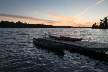 Boats at a dock, Kenora, Lake of The Woods, Ontario, Canadaのeditorial素材