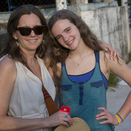 Woman with her daughter smiling, Cayman Cay, Utila Island, Bay Islands, Hondurasのeditorial素材