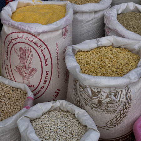 Lentils and beans for sale in a souk, Arset El Maach, Marrakesh, Moroccoのeditorial素材