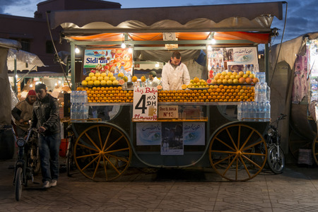 Street vendor selling fruits in a market, Djemma El Fna, Marrakesh, Moroccoのeditorial素材