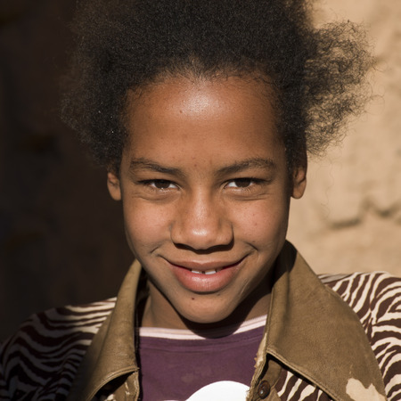 Portrait of a boy smiling, Kasbah Azul, Agdz, Moroccoの写真素材