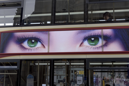 Poster of eyes on tour bus, Edinburgh, Scotlandのeditorial素材