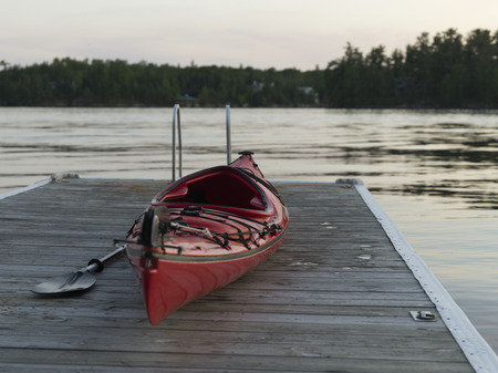 Kayak on a boardwalk, Lake of The Woods, Ontario, Canadaの写真素材