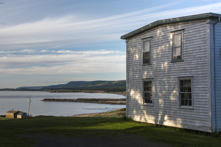 Houses at waterfront, Margaree River, Margaree Harbour, Cabot Trail, Cape Breton Island, Nova Scotia, Canadaのeditorial素材
