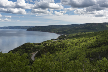 Scenic view of a coastal road, Pleasant Bay, Cape Breton Highlands National Park, Cape Breton Island, Nova Scotia, Canadaの写真素材