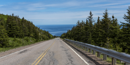 Scenic view of a coastal road, Cabot Trail, Cape Breton Highlands National Park, Cape Breton Island, Nova Scotia, Canadaの写真素材
