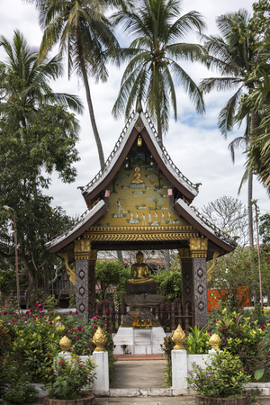 Statue of Buddha at temple, Wat Xieng Thong temple, Luang Prabang, Laosのeditorial素材