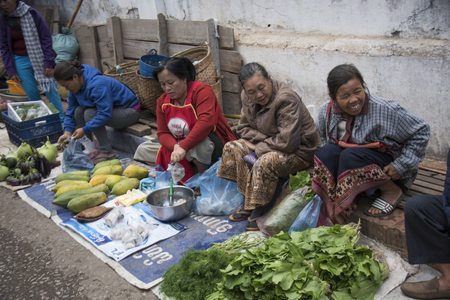 Street vendors selling vegetables, Luang Prabang, Laosのeditorial素材