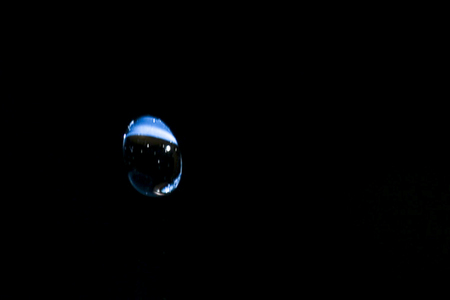 Close-up of drop falling, Kenora, Lake of the Woods, Ontario, Canada