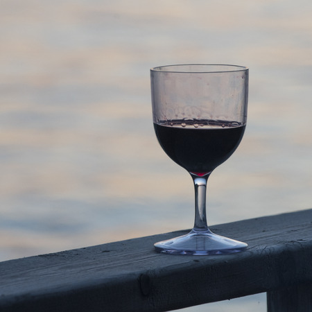 Close-up of a wineglass, Kenora, Lake of the Woods, Ontario, Canadaの写真素材