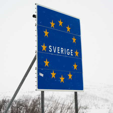 Low angle view of signboard in snow, Arjeplog, Norrbotten County, Lapland, Swedenの写真素材