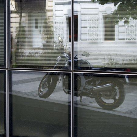 View of a Motorcycle parked outside on a street, Belgrade, Serbia