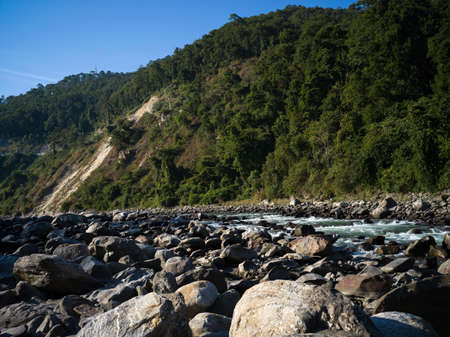 Scenic view of river flowing through rocks, Darjeeling, West Bengal, India