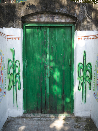 Close-up of closed green door, Kolkata, West Bengal, Indiaの写真素材