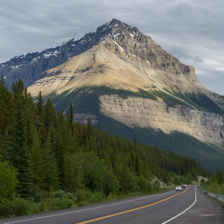 Sunlight on mountain peak, seen from Icefields Parkway, Jasper, Alberta, Canadaのeditorial素材