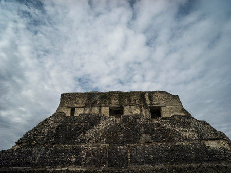 Low angle view of ruins of Mayan pyramid, Ancient Mayan Archaeological Site, San Jose Succotz, Cayo District, Belizeのeditorial素材