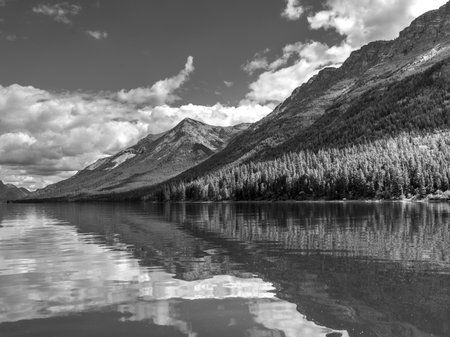 Lake with mountain range in the background, Waterton Lake, Waterton-Glacier International Peace Park, Waterton Lakes National Park, Alberta, Canadaのeditorial素材